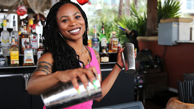 Bartender pouring a drink at Margaritaville Resort Casino